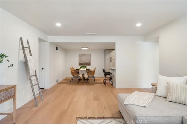 25564 Sharp Dr Unit G, Hemet, CA 92544 - living area featuring light wood-type flooring and recessed lighting