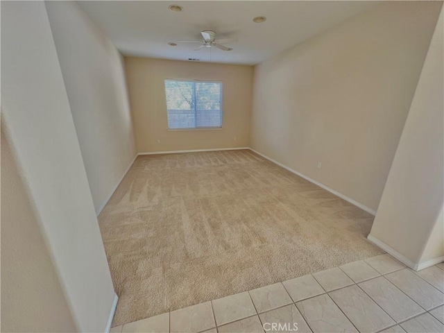 3642 Neola Way, Lancaster, CA 93536 - spare room with light colored carpet, ceiling fan, and light tile patterned floors