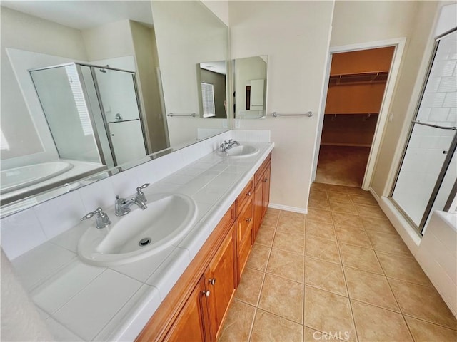 3642 Neola Way, Lancaster, CA 93536 - full bath with a shower stall, double vanity, a walk in closet, and tile patterned floors