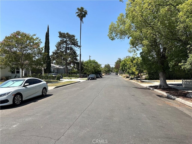4830 Sancola Ave, North Hollywood, CA 91601 - view of asphalt street featuring curbs and sidewalks