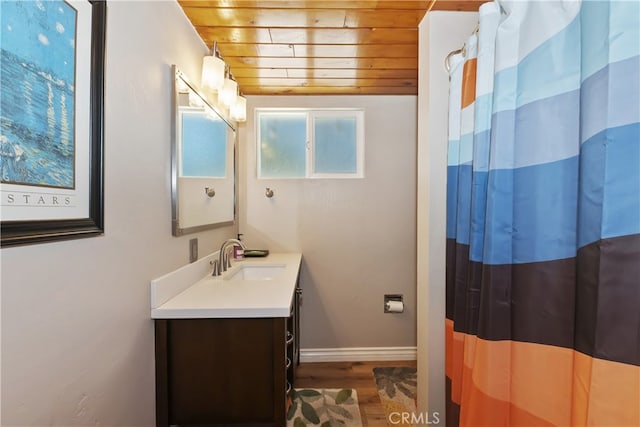 31449 Onacrest Dr, Running Springs, CA 92382 - bathroom with wooden ceiling, vanity, wood finished floors, and a shower with curtain