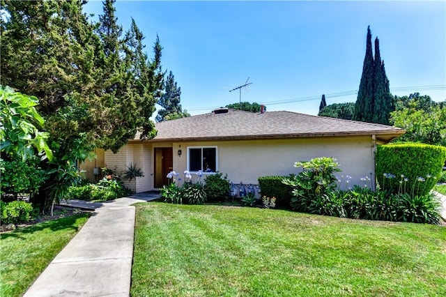 1881 Mitchell Ave Unit 8, Tustin, CA 92780 - view of front of home with a front yard and stucco siding