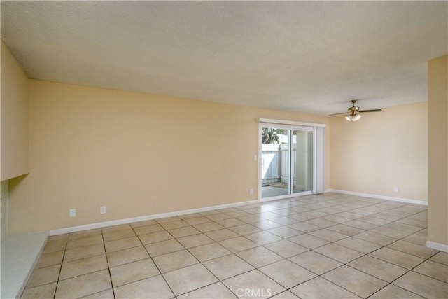 1881 Mitchell Ave Unit 8, Tustin, CA 92780 - empty room with light tile patterned flooring and ceiling fan