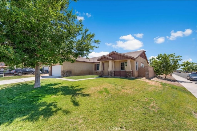 38181 Silver Ct, Palmdale, CA 93552 - view of front of house featuring driveway, stucco siding, stone siding, a front yard, and a porch