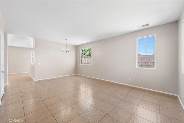 38181 Silver Ct, Palmdale, CA 93552 - empty room with a chandelier and light tile patterned floors