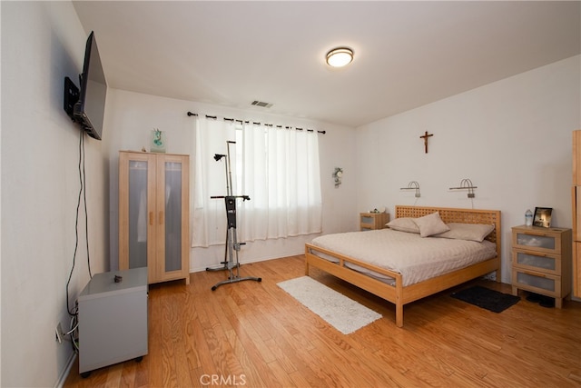 29427 Bentcreek Ct, Menifee, CA 92584 - bedroom with light wood-style flooring and baseboards
