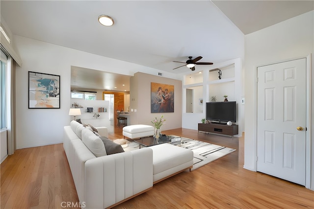 29427 Bentcreek Ct, Menifee, CA 92584 - living room featuring ceiling fan, light wood finished floors, and built in features