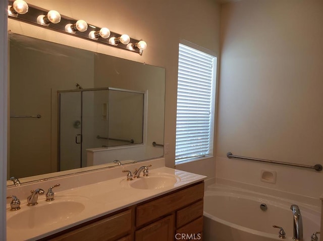 11142 Avonlea Rd, Apple Valley, CA 92308 - bathroom with a stall shower, a bath, and double vanity