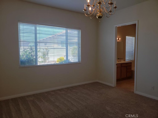 11142 Avonlea Rd, Apple Valley, CA 92308 - spare room featuring a chandelier and light carpet