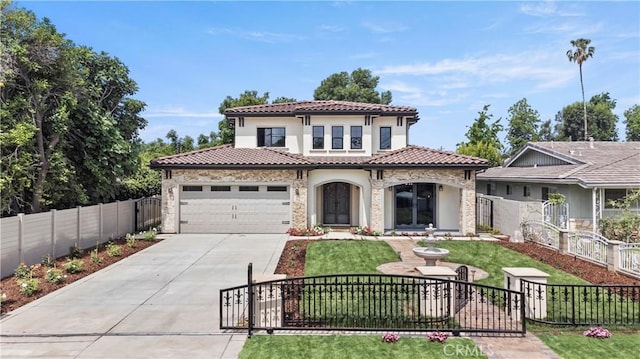 1935 S 6th Ave, Arcadia, CA 91006 - mediterranean / spanish home featuring concrete driveway, a tiled roof, stone siding, stucco siding, and a garage