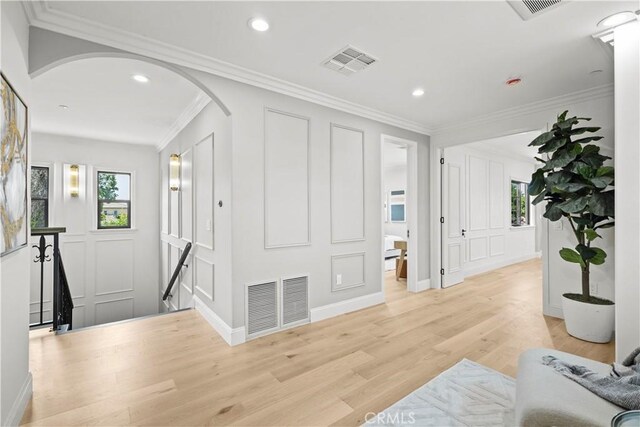 1935 S 6th Ave, Arcadia, CA 91006 - entrance foyer featuring a decorative wall, arched walkways, ornamental molding, light wood finished floors, and recessed lighting