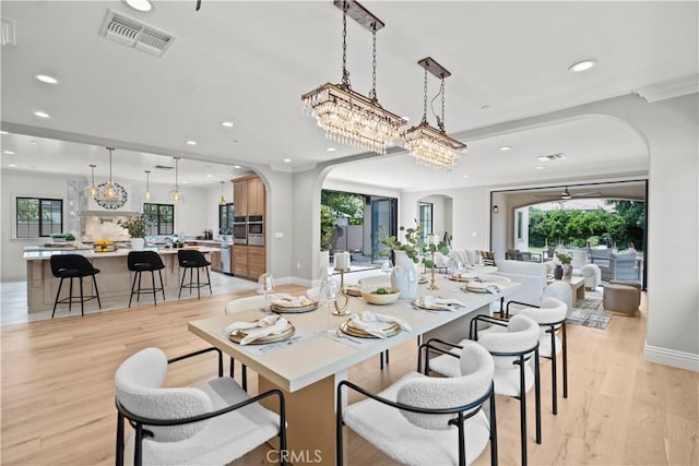1935 S 6th Ave, Arcadia, CA 91006 - dining area featuring arched walkways, recessed lighting, light wood-style floors, and ceiling fan