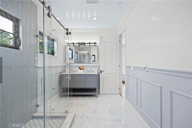 1935 S 6th Ave, Arcadia, CA 91006 - bathroom featuring vanity, a shower stall, ornamental molding, marble look tile flooring, and wainscoting
