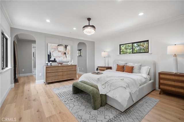 1935 S 6th Ave, Arcadia, CA 91006 - bedroom featuring arched walkways, ornamental molding, recessed lighting, and light wood-style flooring