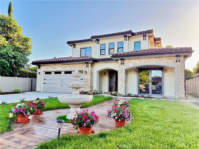 1935 S 6th Ave, Arcadia, CA 91006 - mediterranean / spanish house with driveway, a tiled roof, stone siding, stucco siding, and an attached garage