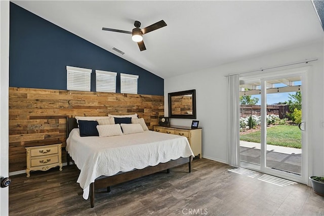 28591 Corvus Way, Menifee, CA 92586 - bedroom with vaulted ceiling, access to exterior, wood finished floors, ceiling fan, and wood walls