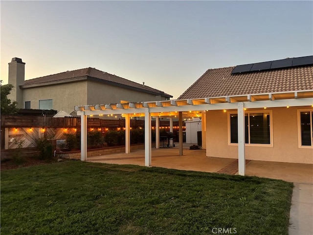 28591 Corvus Way, Menifee, CA 92586 - rear view of house featuring a yard, a pergola, stucco siding, and a tile roof
