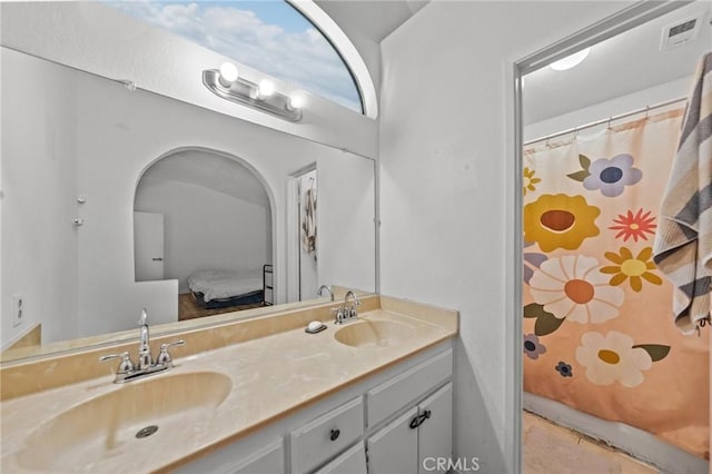 430 Anderwood Ct Unit 24, Pomona, CA 91768 - bathroom featuring connected bathroom, double vanity, and a shower with shower curtain