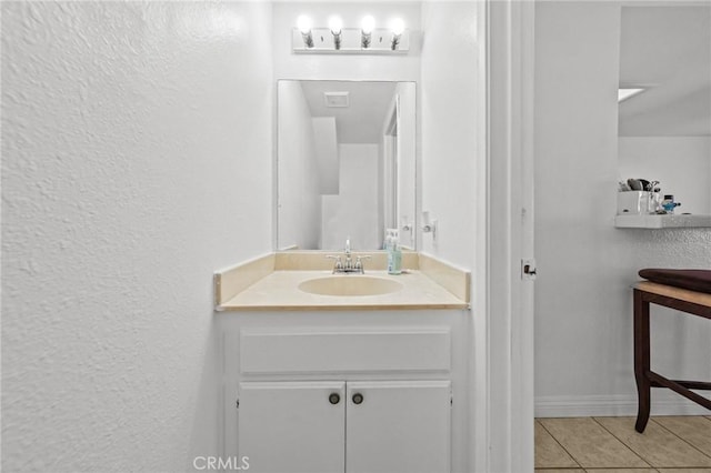 430 Anderwood Ct Unit 24, Pomona, CA 91768 - bathroom with vanity, tile patterned floors, and a textured wall