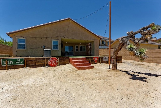 12745 Autumn Leaves Ave, Victorville, CA 92395 - rear view of house with stucco siding