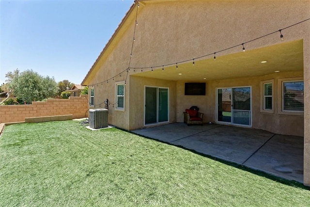 12745 Autumn Leaves Ave, Victorville, CA 92395 - back of house with stucco siding and a patio