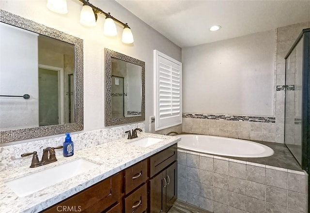 12745 Autumn Leaves Ave, Victorville, CA 92395 - bathroom featuring a bath and double vanity