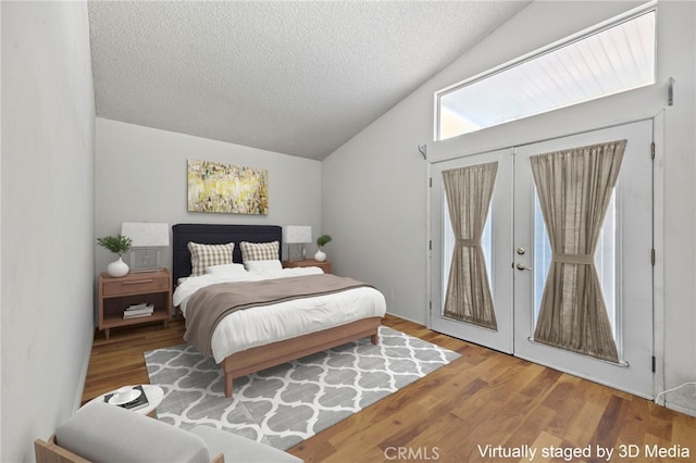 25683 Hillman Ct, Menifee, CA 92586 - bedroom with lofted ceiling, a textured ceiling, access to exterior, wood finished floors, and french doors