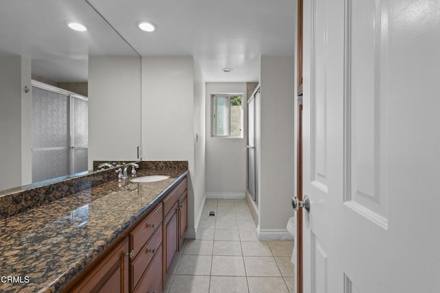 590 Alosta Dr, Camarillo, CA 93010 - full bathroom featuring a shower with shower door, vanity, tile patterned flooring, and recessed lighting
