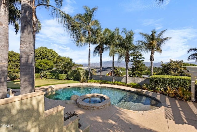 590 Alosta Dr, Camarillo, CA 93010 - view of swimming pool featuring a mountain view, a pool with connected hot tub, and a patio area