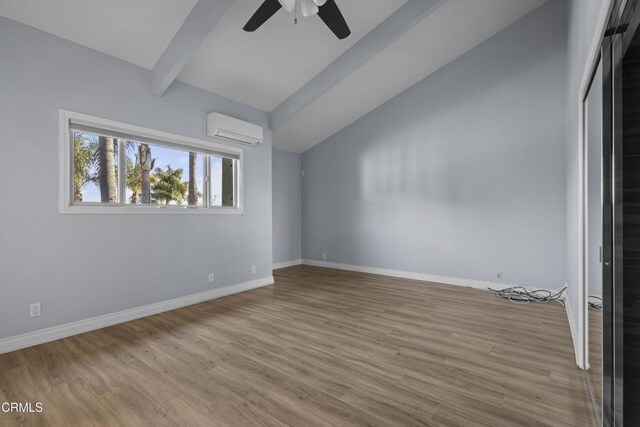 590 Alosta Dr, Camarillo, CA 93010 - spare room featuring a wall mounted AC, ceiling fan, and wood finished floors