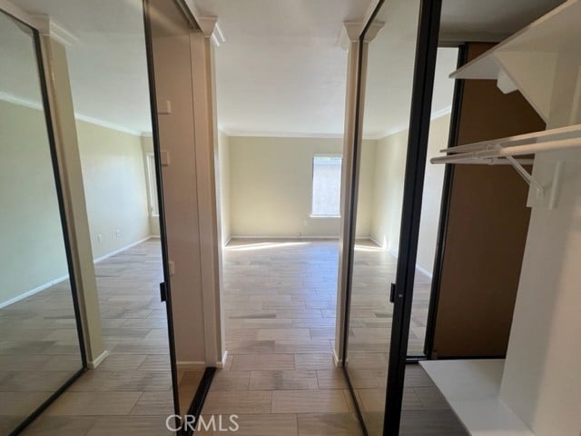24321 El Pilar Unit 11, Laguna Niguel, CA 92677 - hall with crown molding and wood finished floors