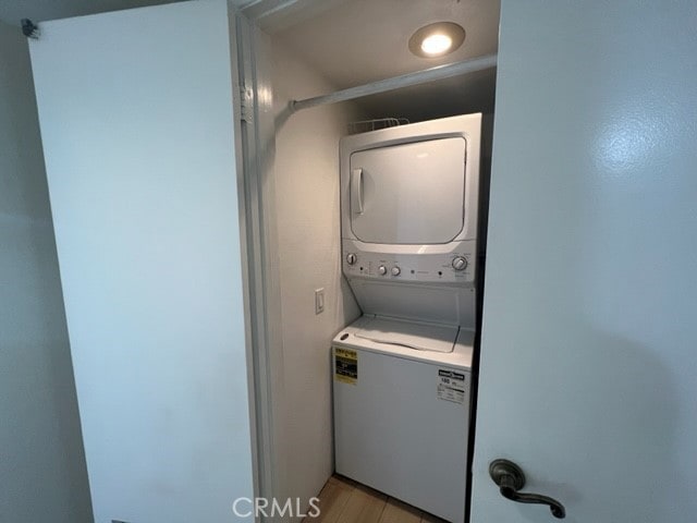 24321 El Pilar Unit 11, Laguna Niguel, CA 92677 - washroom with stacked washing machine and dryer