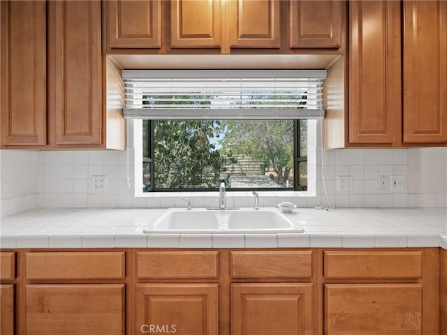31709 213th St E, Llano, CA 93544 - kitchen with tasteful backsplash, light countertops, and plenty of natural light