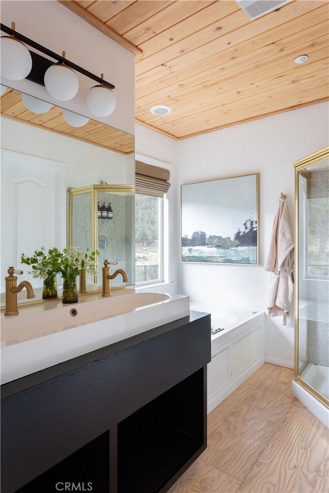2000 Baldwin Lake Rd, Big Bear City, CA 92314 - bathroom with wood ceiling, vanity, a stall shower, and a garden tub