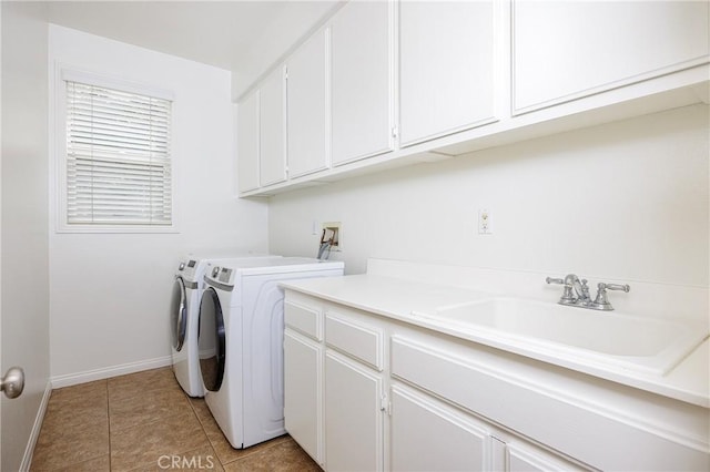 42355 Mountain View Ct, Murrieta, CA 92562 - washroom featuring cabinet space, washing machine and clothes dryer, and light tile patterned floors