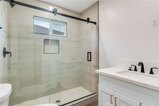 3067 Genevieve St, San Bernardino, CA 92405 - bathroom featuring vanity and a stall shower