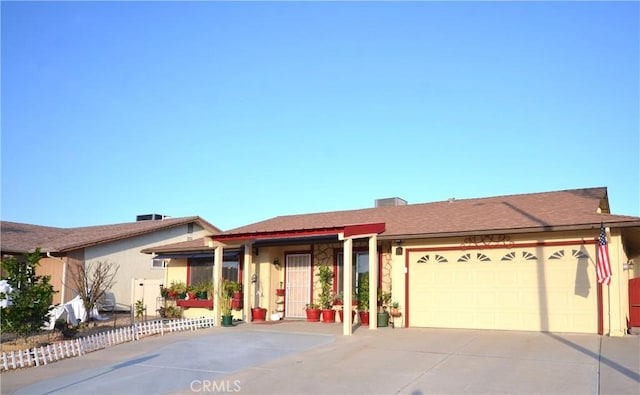 27958 Foxfire St, Menifee, CA 92586 - ranch-style house with concrete driveway and a garage