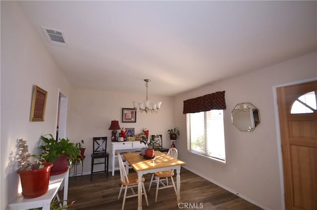 27958 Foxfire St, Menifee, CA 92586 - dining area with a chandelier and dark wood-style flooring