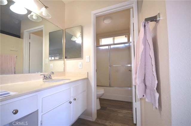 27958 Foxfire St, Menifee, CA 92586 - full bathroom featuring vanity, wood finished floors, and enclosed tub / shower combo