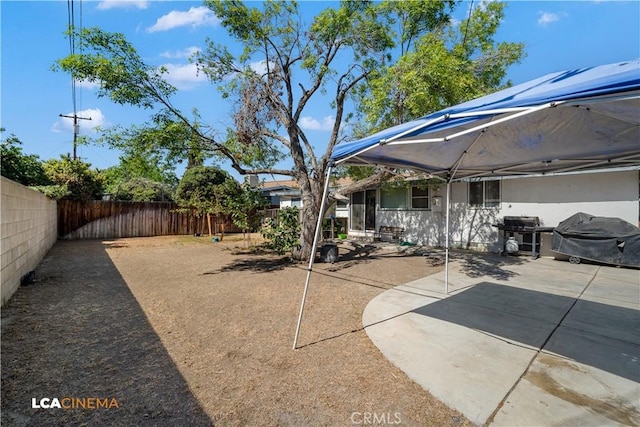 5 Dunlap, Bakersfield, CA 93309 - fenced backyard with a patio area