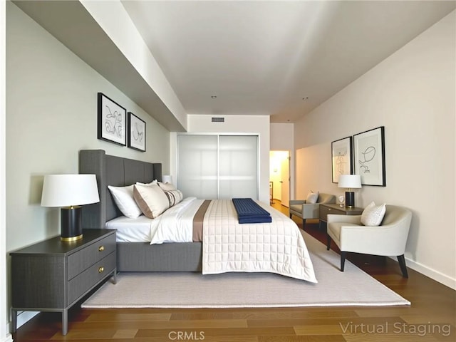1234 Wilshire Blvd Unit 127, Los Angeles, CA 90017 - bedroom with a closet and wood finished floors
