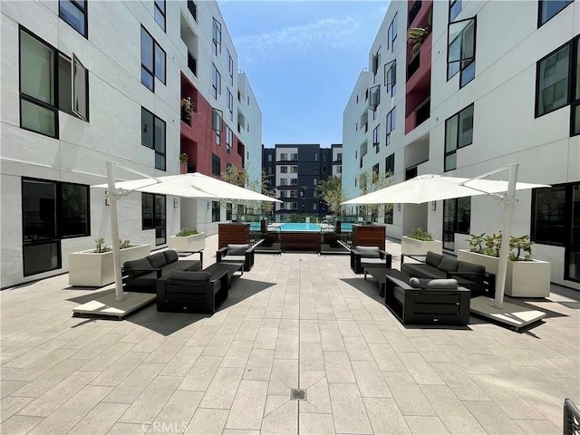 1234 Wilshire Blvd Unit 127, Los Angeles, CA 90017 - view of patio / terrace featuring an outdoor living space
