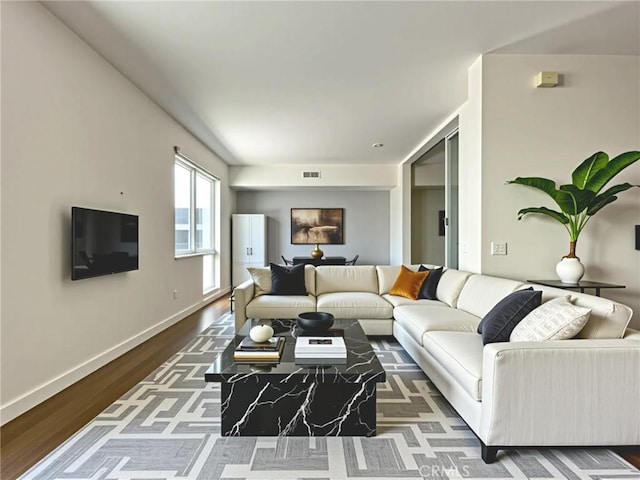 1234 Wilshire Blvd Unit 127, Los Angeles, CA 90017 - living room featuring wood finished floors and baseboards
