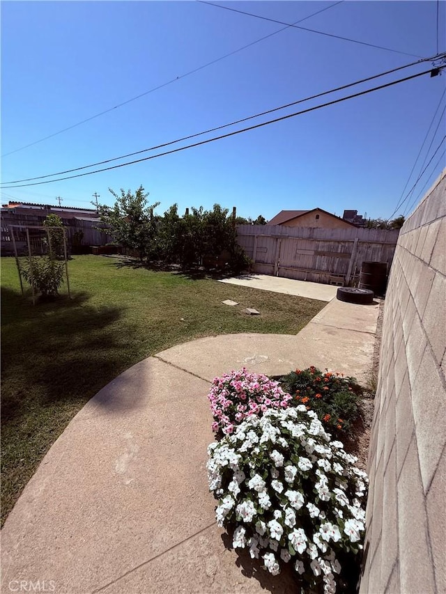 2616 N King St, Bakersfield, CA 93305 - fenced backyard featuring a patio area