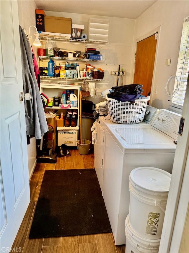 2616 N King St, Bakersfield, CA 93305 - washroom with washing machine and dryer and wood finished floors