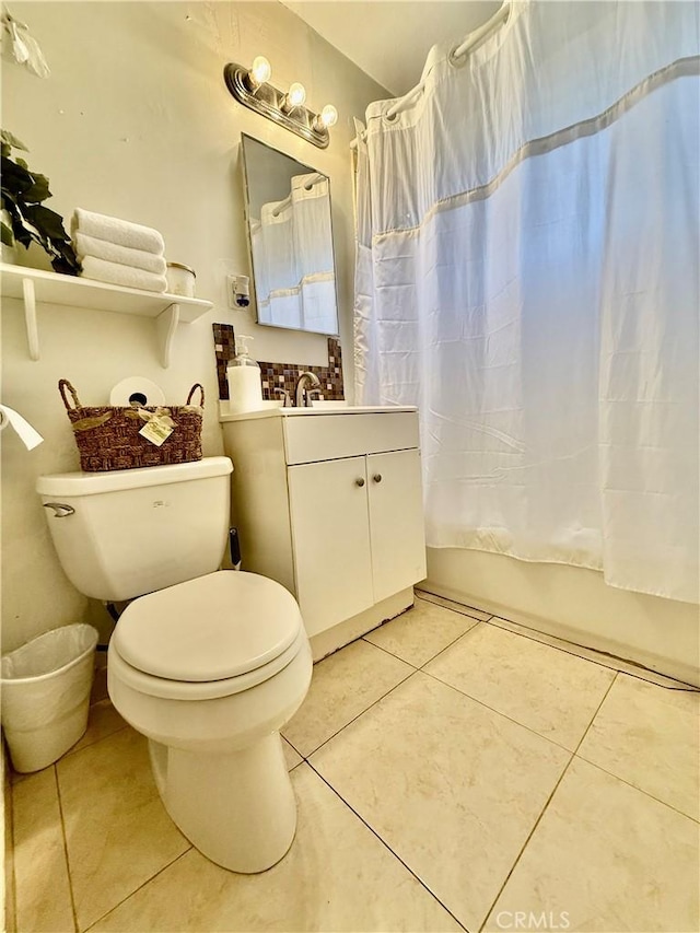 2616 N King St, Bakersfield, CA 93305 - bathroom featuring shower / tub combo with curtain, tile patterned floors, and vanity