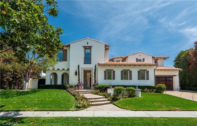 25471 Prado De Oro, Calabasas, CA 91302 - mediterranean / spanish house with stucco siding, a garage, a front yard, driveway, and a tiled roof