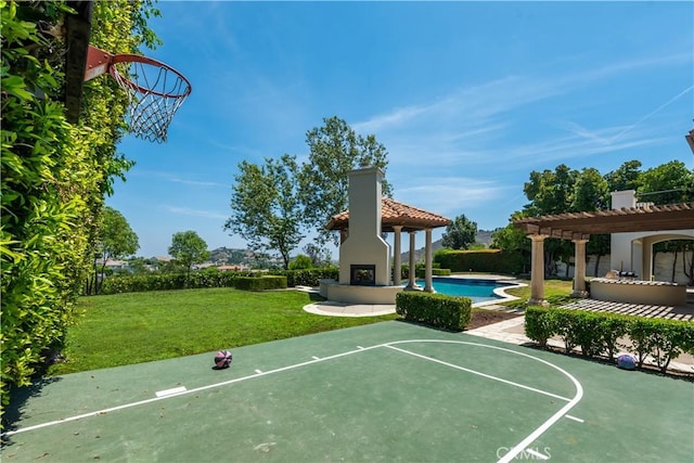 25471 Prado De Oro, Calabasas, CA 91302 - view of basketball court with community basketball court, a pergola, and a lawn