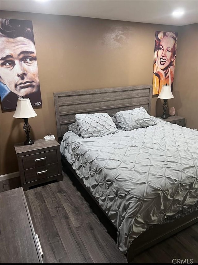 23515 Lyons Ave Unit 277, Valencia, CA 91355 - bedroom with dark wood-style flooring