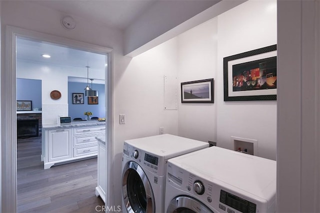 2450 Hermosita Dr, Glendale, CA 91208 - washroom with independent washer and dryer and dark wood-style floors